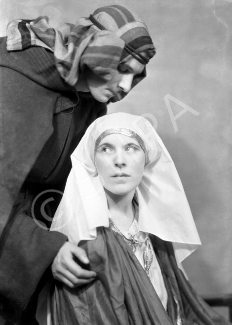 Theatrical actors dressed in costume. Possibly for a Nativity play. #