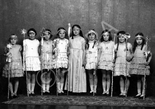 Children in costume, possibly for a theatrical event. #