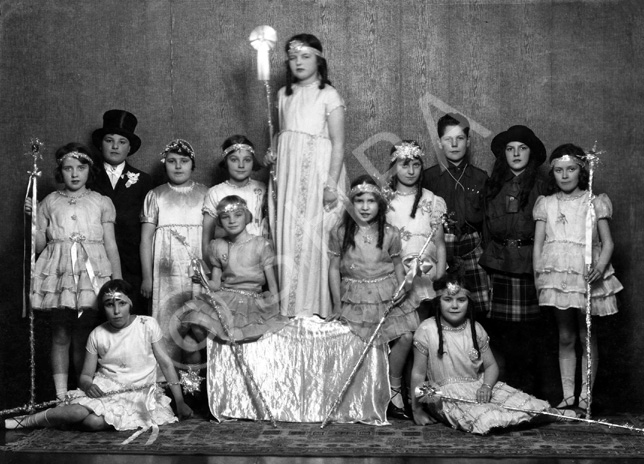 Children in costume, possibly for a theatrical event. #