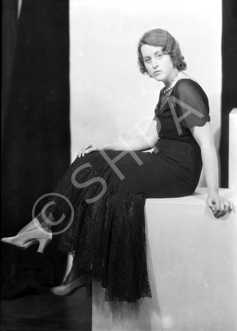 Portrait. This woman also appears in image numbers 29212a-d dated 1932.  #