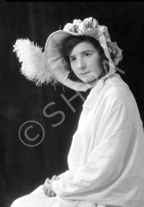 Captioned 'April Showers,' possibly from a theatre production. # 