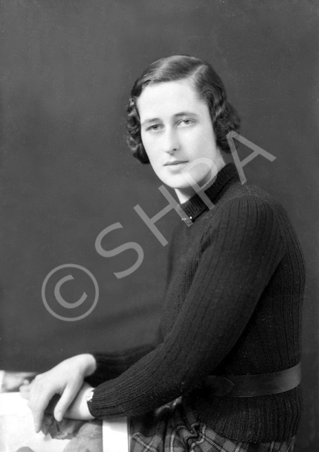 Portrait. Woman also appears in a couple of images in series 30214 with Miss Mitford. #