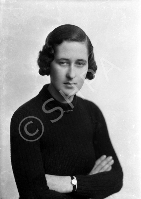 Portrait. Woman also appears in a couple of images in series 30214 with Miss Mitford. #