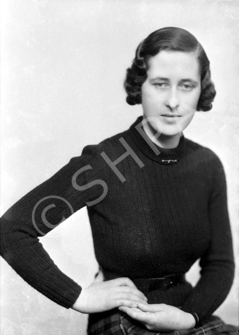 Portrait. Woman also appears in a couple of images in series 30214 with Miss Mitford. #