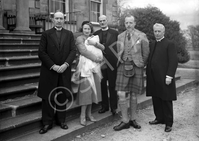 Group on steps, at time of baby christening.# 