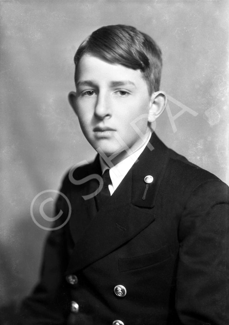 Uniformed boy, possibly merchant navy. #