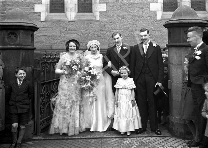 Robertson bridal group outside Ness Bank Church. The stone plinths still remain after recent renovations to comply with the requirements of the Disability Discrimination Act for access to the Church.