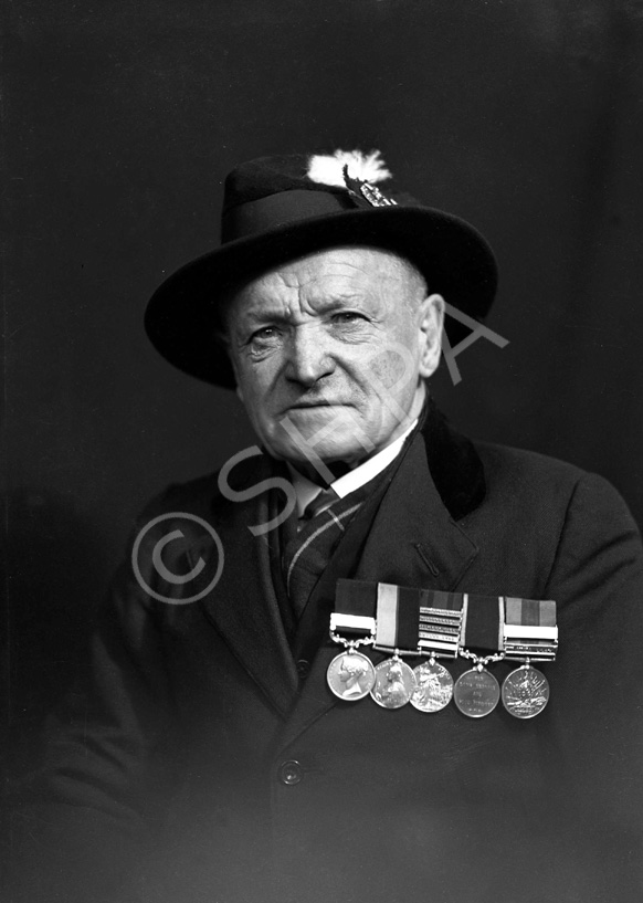 Mr Collins, Clachnaharry. His medals include the India General Service medal (1854-1895), Queen's Sudan medal (1896-1897), Queen's South Africa medal (1899-1902), unidentified and the Khedive's Sudan medal (1896-1908). See also image 36719.5. 