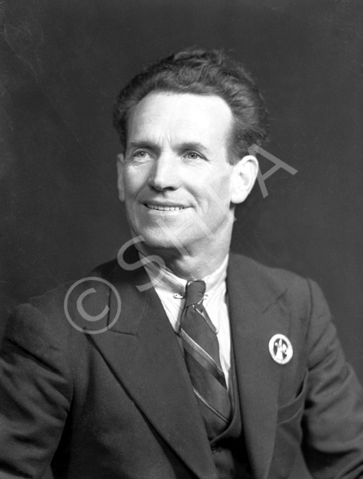 Frank G. Power,  Newfoundland F.U. He is wearing a  World War II Newfoundland Forestry Unit, 3rd Inverness Battalion, Scottish Home Guard Badge. These silver plated badges, worn in the field service cap or as mufti lapel badge are now very rare. See also 38350_earles. 