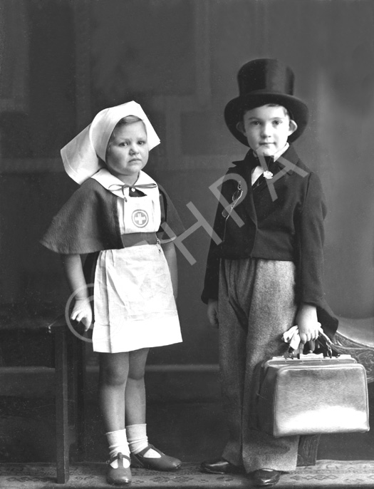 Andrew Chalmers and Elizabeth Bremner dressed as doctor and nurse. (see also refs: 33898, 39880, 42901 and 45474). Andrew was a grandson of the famous photographer Andrew Paterson (1877-1948). 