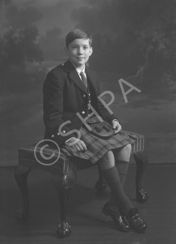 Andrew Chalmers dressed in school uniform for Sundays at the Loretto Boarding School, Edinburgh. (see also refs: 33898, 39550 and 45474). He was a grandson of the famous photographer Andrew Paterson (1877-1948).