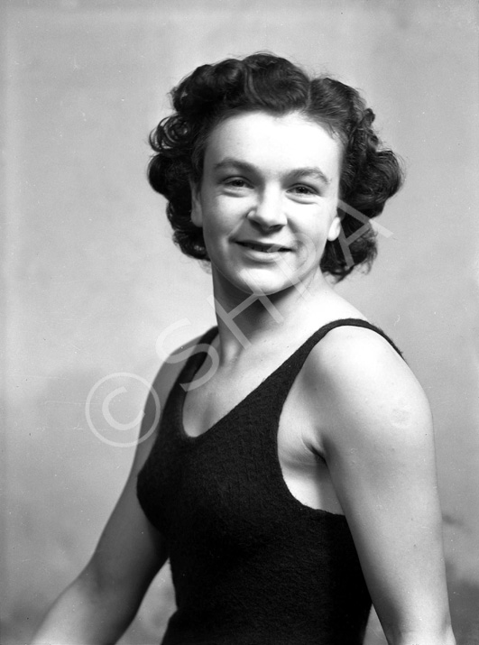 Miss Margaret Munro was the holder of several national swimming titles. She later emigrated to Australia. See also 38323a/b.