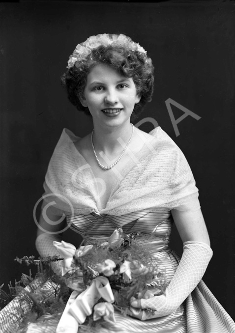 Miss M. Brown, bridesmaid to the Ralph wedding c.1954.