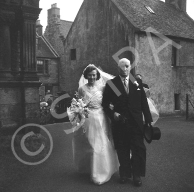 Miller, 'Broomfield,' February 1954. Bride Pat Fraser and father entering the Old High Church on Church Street, Inverness.