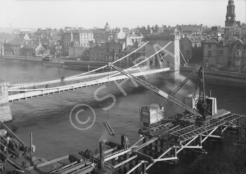 Temporary bridge building Jul-Aug 1939, showing Ness Bridge in background. (Ness Bridge was finally demolished in 1959).*