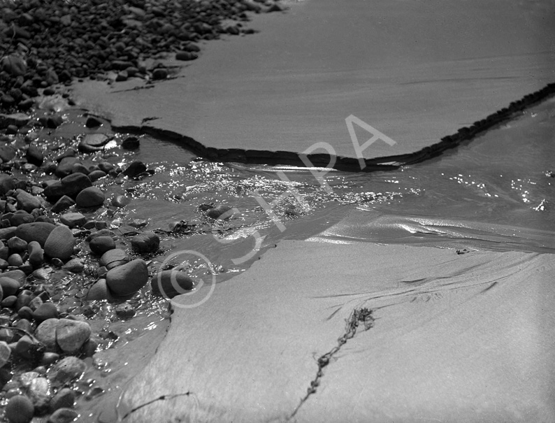 Running water through sand.*