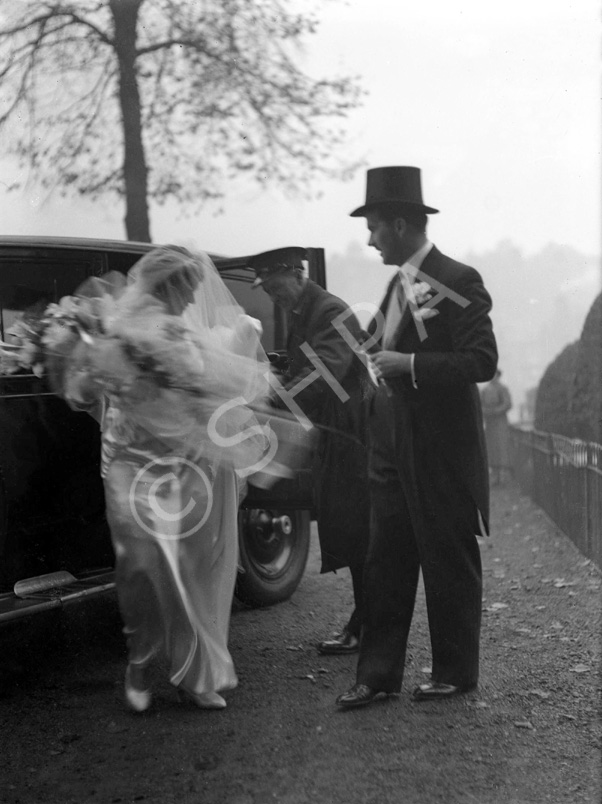 Hector Paterson (1904-1988) - Stella Saunders (1904-1987) wedding. Inverness Cathedral 1937. Hector was the son of famous photographer Andrew Paterson (1877-1948). Stella is being helped from her bridal vehicle by Dr. Alastair MacLeod. Stella worked with him, as Secretary in his practices, in Wimbledon and Central London from the early 1930s until her marriage in 1937. 