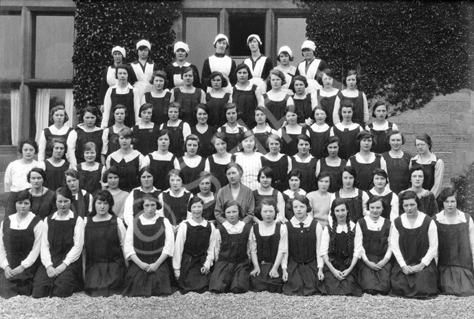 The Inverness Royal Academy War Memorial Hostel, June 1924. The hostel opened in 1922, with accommodation for about 60 girls. In the centre of the second-front row is the first matron, Miss Isabella Paterson. The hostel was partly funded by contributions from the Old Boys' Club, led by Evan Barron, a well-known former pupil. The building first used was the former Inverness Collegiate School building in Ardross Street, which is now the oldest part of the Highland Council Headquarters buildings. The hostel was moved to Hedgefield House in Culduthel Road in 1934. (Courtesy Inverness Royal Academy Archive IRAA_058). 